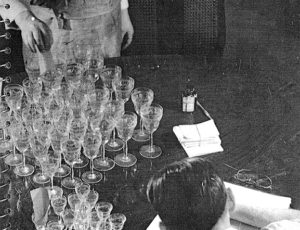 Treuhandstelle employees with confiscated glassware (source: Yad Vashem Archive)