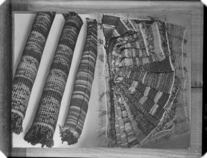 Treuhandstelle depot: Rolled up carpets confiscated from Jewish apartments (source: http://collections.jewishmuseum.cz)